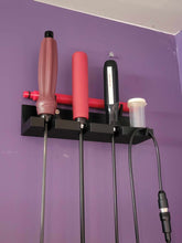 Wall Holder Of Rods Etc.